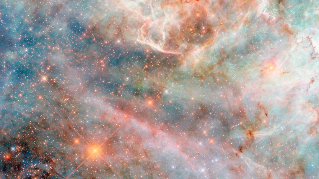 Hubble Captures ‘Candyfloss’ Clouds in a Neighboring Galaxy: A Stunning Visual Feast